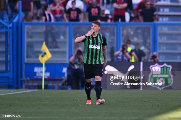 Andrea Pinamonti of US Sassuolo celebrates scoring his team's first goal during the Serie A TIM match between US Sassuolo and AC Milan at Mapei...