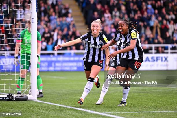 Emma Kelly of Newcastle United celebrates scoring her team's first goal with teammate Paige Bailey-Gale during The FA Women's National League...