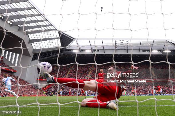 Andrew Robertson of Liverpool clears a shot off the line from Jean-Philippe Mateta of Crystal Palace during the Premier League match between...