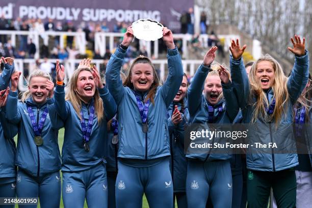 Amy Hargrave of Newcastle United Development lifts The FA Women's National League Reserve Northern Division trophy at half-time during The FA Women's...