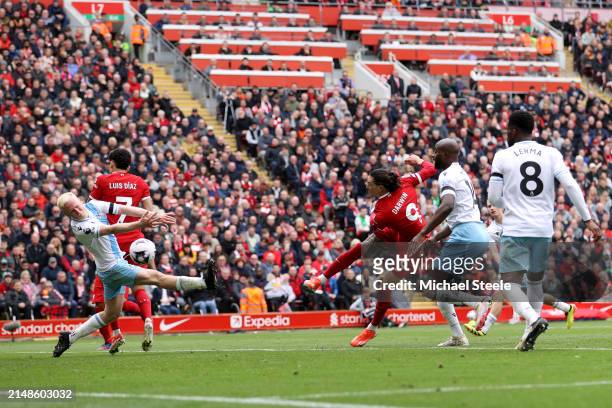 Darwin Nunez of Liverpool shoots during the Premier League match between Liverpool FC and Crystal Palace at Anfield on April 14, 2024 in Liverpool,...