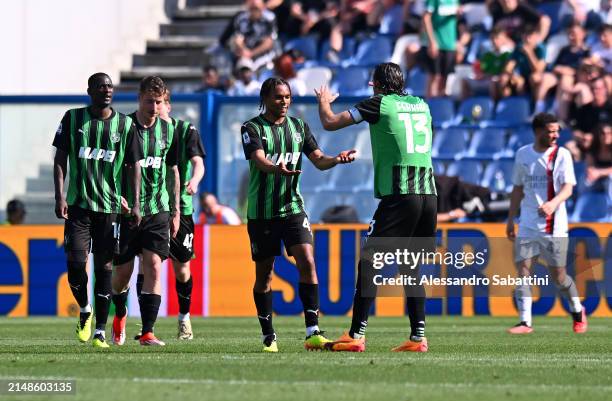 Armand Lauriente of US Sassuolo celebrates scoring his team's third goal with teammate Gian Marco Ferrari during the Serie A TIM match between US...