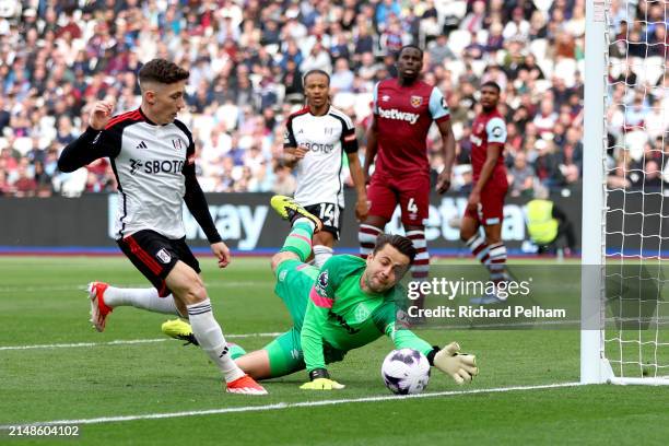 Harry Wilson of Fulham shoots and misses during the Premier League match between West Ham United and Fulham FC at London Stadium on April 14, 2024 in...