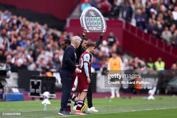 George Earthy of West Ham United comes on the pitch for Michail Antonio of West Ham United during the Premier League match between West Ham United...