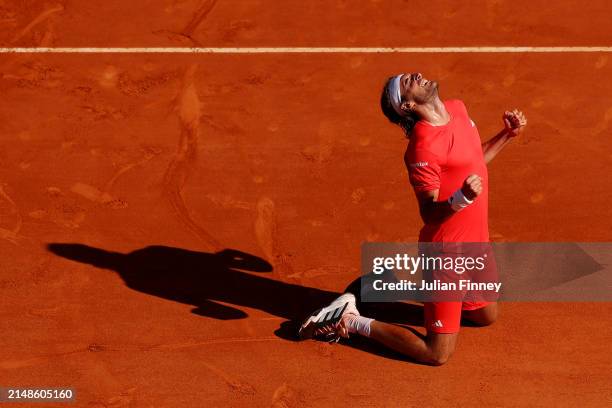 Stefanos Tsitsipas of Greece celebrates after winning match point against Casper Ruud of Norway during the Men's Double's Final on day eight of the...