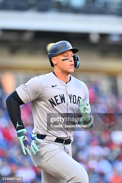 Aaron Judge of the New York Yankees runs out a ground ball for an out during the third inning of game two of a doubleheader against the Cleveland...