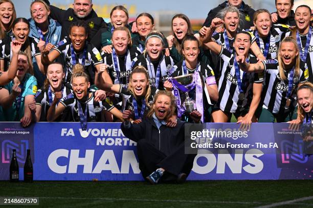 Amanda Staveley, Co-Owner of Newcastle United, and players of Newcastle United, pose for a photo with The FA Women's National League Northern Premier...