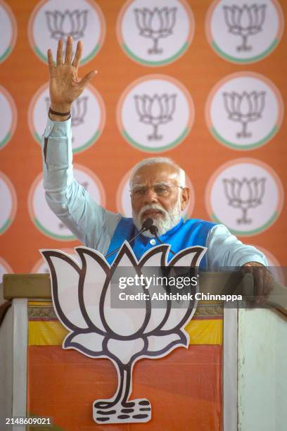 Prime Minister Narendra Modi gestures as he addresses an election campaign rally on April 14, 2024 in Mysuru, India. India's 2024 general election is...