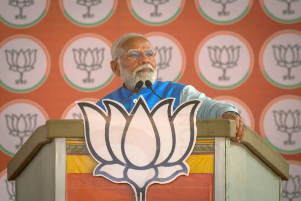 Prime Minister Narendra Modi gestures as he addresses an election campaign rally on April 14, 2024 in Mysuru, India. India's 2024 general election is...