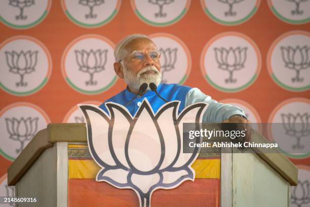 Prime Minister Narendra Modi gestures as he addresses an election campaign rally on April 14, 2024 in Mysuru, India. India's 2024 general election is...