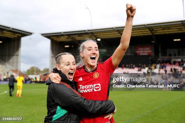 Leah Galton and Millie Turner of Manchester United Women celebrate the team's victory after the Adobe Women's FA Cup Semi Final match between...