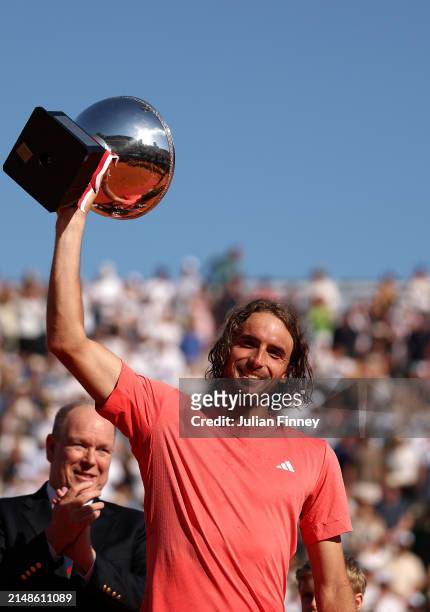 Stefanos Tsitsipas of Greece poses for a photograph with the trophy after his victory over Casper Ruud of Norway in the Men's Double's Final on day...