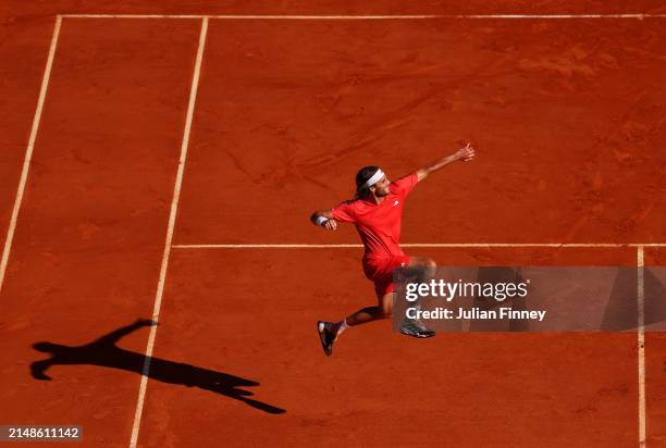 Stefanos Tsitsipas of Greece leaps in the air as he celebrates victory against Casper Ruud of Norway during the Men's Double's Final on day eight of...