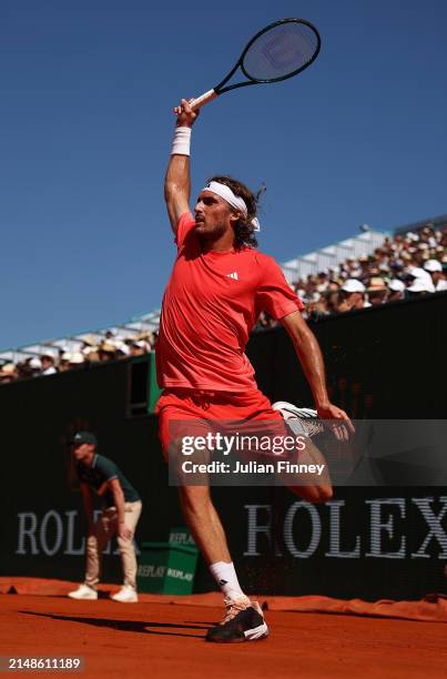 Stefanos Tsitsipas of Greece plays a backhand against Casper Ruud of Norway during the Men's Double's Final on day eight of the Rolex Monte-Carlo...