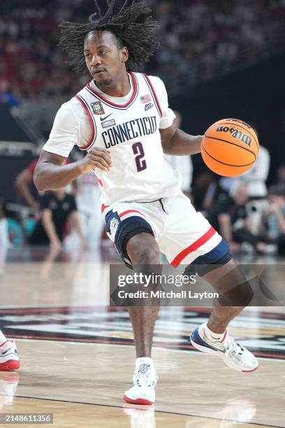 Stephon Castle of The Connecticut Huskies dribbles the ball during the NCAA Mens Basketball Tournament Final Four semifinal game against the Alabama...