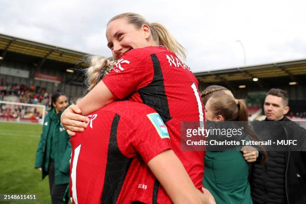 Millie Turner and Lisa Fjeldstad Naalsund of Manchester United Women celebrate the team's victory after the Adobe Women's FA Cup Semi Final match...