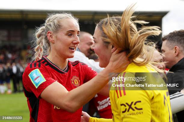 Millie Turner and Mary Earps of Manchester United Women celebrate the team's victory after the Adobe Women's FA Cup Semi Final match between...