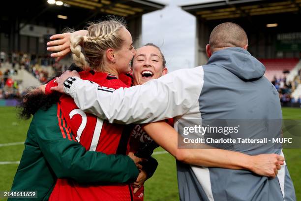 Maya Le Tissier, Jayde Riviere and Millie Turner of Manchester United Women celebrate the team's victory after the Adobe Women's FA Cup Semi Final...