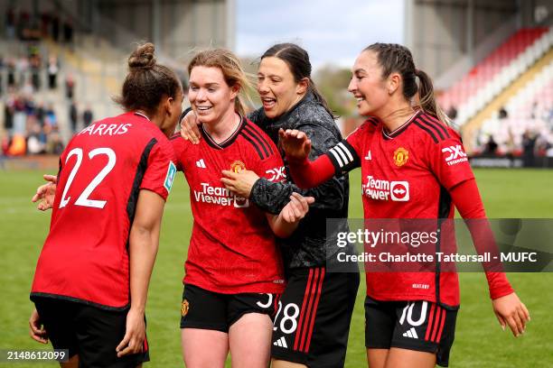 Nikita Paris, Aoife Mannion, Rachel Williams and Katie Zelem of Manchester United Women celebrate the team's victory after the Adobe Women's FA Cup...