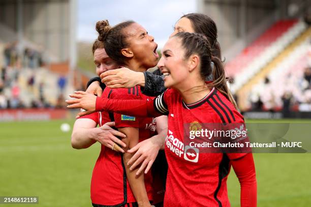 Nikita Paris, Aoife Mannion, Rachel Williams and Katie Zelem of Manchester United Women celebrate the team's victory after the Adobe Women's FA Cup...