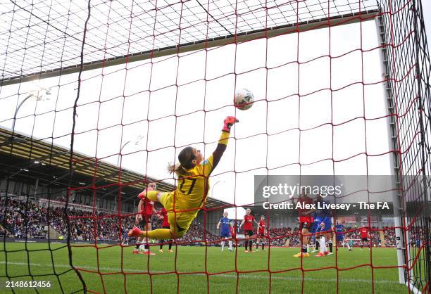 Mary Earps of Manchester United makes a vital save from a header from Lauren James of Chelsea during the Adobe Women's FA Cup Semi Final match...