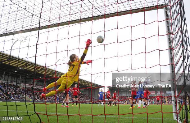 Mary Earps of Manchester United makes a vital save from a header from Lauren James of Chelsea during the Adobe Women's FA Cup Semi Final match...