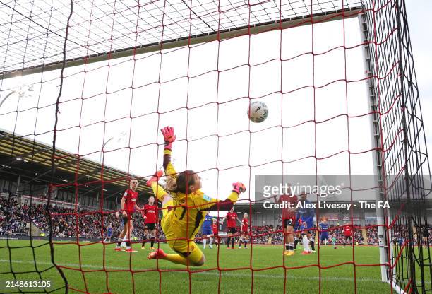 Mary Earps of Manchester United makes a vital save from a header from Lauren James of Chelsea during the Adobe Women's FA Cup Semi Final match...