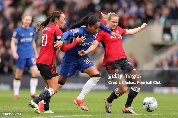 Mayra Ramirez of Chelsea Women battles with Katie Zelem and Lisa Naalsund of Manchester United during the Adobe Women's FA Cup Semi Final match...