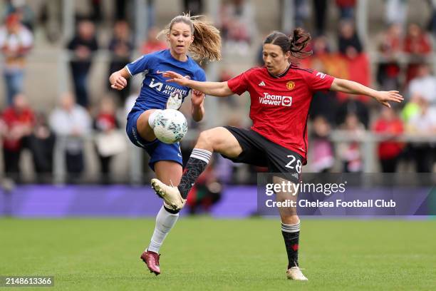 Melanie Leupolz of Chelsea Women battles with Rachel Williams of Manchester United during the Adobe Women's FA Cup Semi Final match between...