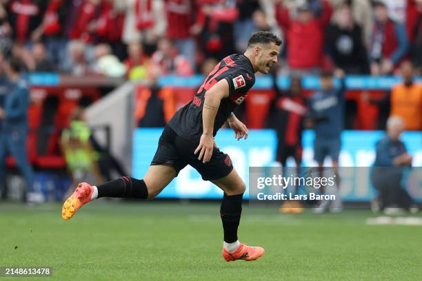 Granit Xhaka of Bayer Leverkusen celebrates scoring his team's second goal during the Bundesliga match between Bayer 04 Leverkusen and SV Werder...
