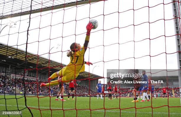 Mary Earps of Manchester United makes a vital save from a header from Lauren James of Chelsea during the Adobe Women's FA Cup Semi Final match...