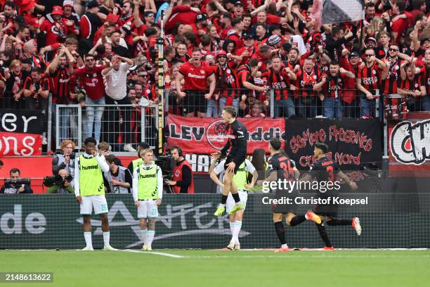 Florian Wirtz of Bayer Leverkusen celebrates scoring his team's third goal during the Bundesliga match between Bayer 04 Leverkusen and SV Werder...