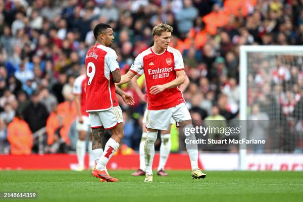 Martin Odegaard of Arsenal gives the captain's armband to Gabriel Jesus of Arsenal during the Premier League match between Arsenal FC and Aston Villa...
