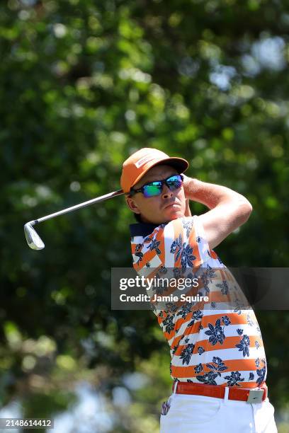 Rickie Fowler of the United States plays his shot from the fourth tee during the final round of the 2024 Masters Tournament at Augusta National Golf...
