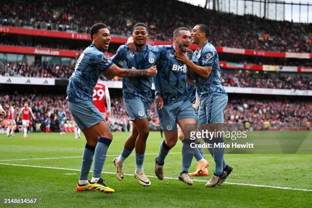 Leon Bailey of Aston Villa celebrates scoring his team's first goal with teammates during the Premier League match between Arsenal FC and Aston Villa...