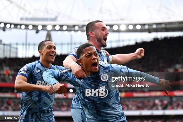 Leon Bailey of Aston Villa celebrates scoring his team's first goal with teammates during the Premier League match between Arsenal FC and Aston Villa...