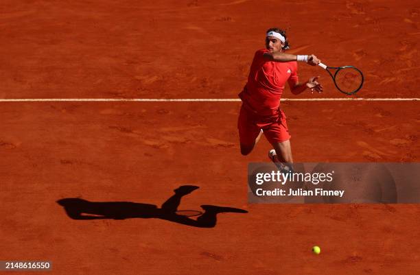 Stefanos Tsitsipas of Greece plays a forehand against Casper Ruud of Norway during the Men's Double's Final on day eight of the Rolex Monte-Carlo...