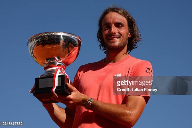 Stefanos Tsitsipas of Greece poses for a photograph with the trophy after his victory over Casper Ruud of Norway in the Men's Double's Final on day...