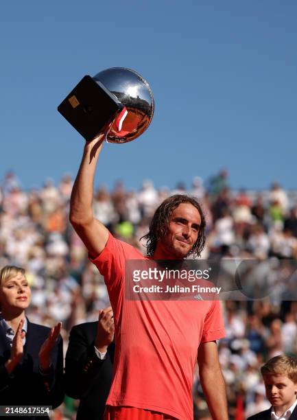 Stefanos Tsitsipas of Greece poses for a photograph with the trophy after his victory over Casper Ruud of Norway in the Men's Final on day eight of...