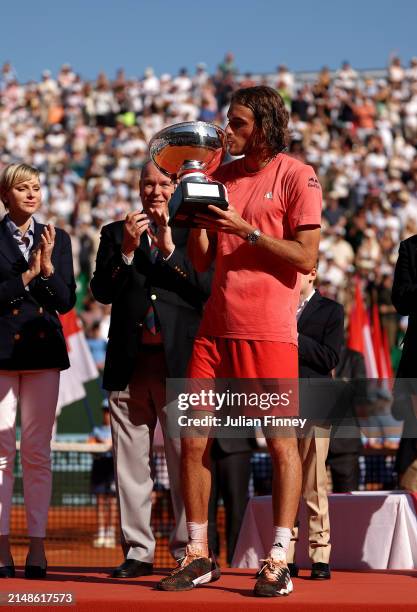 Stefanos Tsitsipas of Greece poses for a photograph with the trophy after his victory over Casper Ruud of Norway in the Men's Final on day eight of...