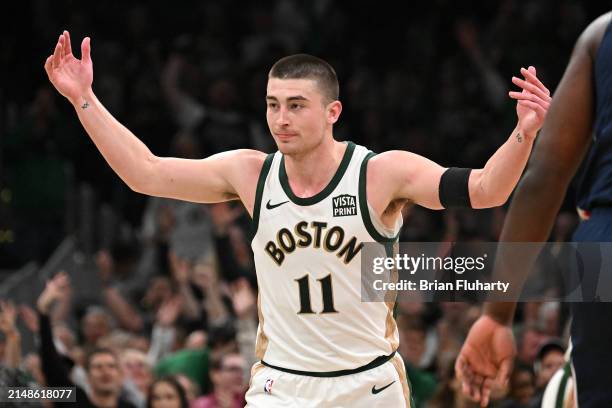 Payton Pritchard of the Boston Celtics reacts after making a three-point basket against the Washington Wizards during the second quarter at the TD...