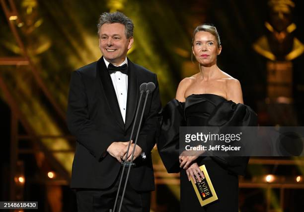 Michael Sheen and Anna Maxwell Martin presenting on stage during The Olivier Awards 2024 at The Royal Albert Hall on April 14, 2024 in London,...
