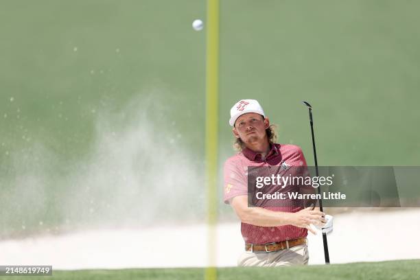 Cameron Smith of Australia plays his shot from the bunker on the second hole during the final round of the 2024 Masters Tournament at Augusta...