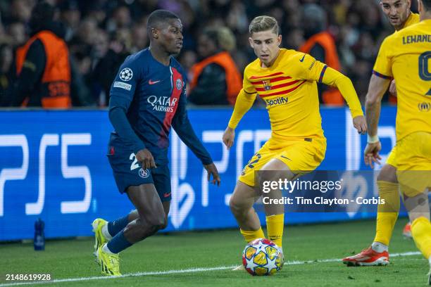 Fermín of Barcelona defended by Nuno Mendes of Paris Saint-Germain during the Paris Saint-Germain V Barcelona, UEFA Champions League, Quarter-Final,...
