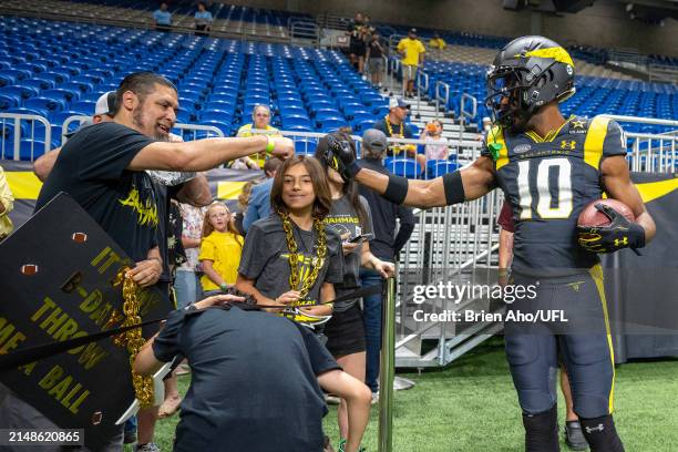 Justin Smith of the San Antonio Brahmas fist bumps fans prior to the game against the St. Louis Battlehawks at Alamodome on April 14, 2024 in San...