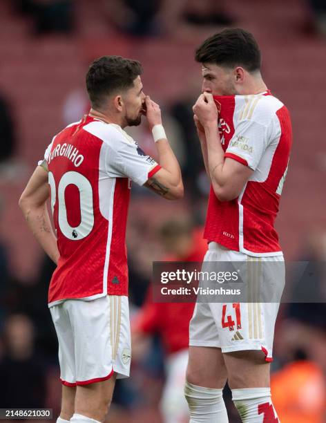 Jorginho and Declan Rice of Arsenal react after losing the Premier League match between Arsenal FC and Aston Villa at Emirates Stadium on April 14,...