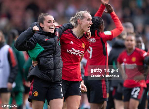 Ella Toone and Millie Turner of Manchester United celebrate after the Adobe Women's FA Cup semi-final between Manchester United and Chelsea at Leigh...