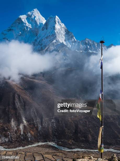 himalayas buddhist prayer flags snowy mountain peak sherpa village nepal - mt everest base camp stock pictures, royalty-free photos & images