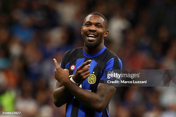 Marcus Thuram of FC Internazionale celebrates scoring his team's first goal during the Serie A TIM match between FC Internazionale and Cagliari at...