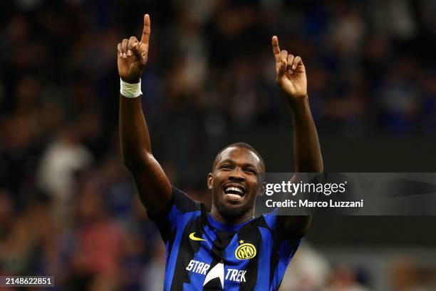 Marcus Thuram of FC Internazionale celebrates scoring his team's first goal during the Serie A TIM match between FC Internazionale and Cagliari at...